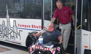 City of Coolidge Transit Manager Michael Meyer assists Aessa, a regular customer on CART, with ease on the 1:6 ramp.