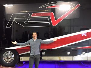 Three-time Indianapolis 500 winner Helio Castroneves with a REV RV.